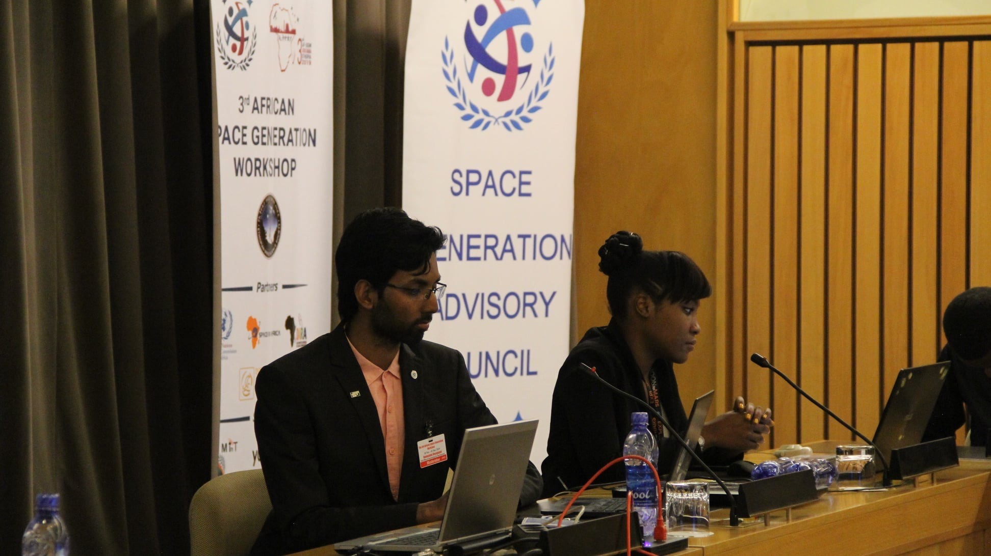 Ms Samanga sitting on a Panel