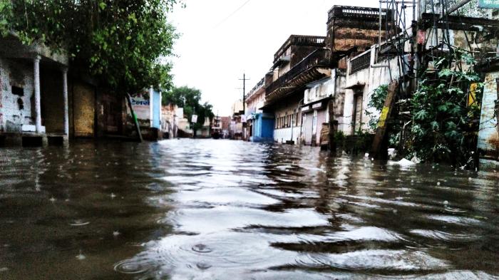 Rain water on the road. CC.