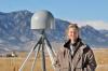 Dr. Kristine M. Larson in front of her favorite GPS site (P041) near Boulder, Colorado. The gray object next to Dr. Larson is a GPS receiver antenna. Photograph by Glenn Asakawa, University of Colorado. Dr. Kristine M. Larson, Professor of Aerospace Engineering Sciences, University of Colorado, Boulder, CO Research interests: Plate tectonics and geodesy, with work developing new ways of using the Global Positioning System (GPS) to study Earth and the water cycle. Research highlights: For many, GPS is a 